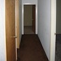 BEFORE: Hallway to back bedroom