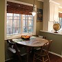 Los Altos Remodel - AFTER: Breakfast nook
With the removal of walls, a cramped laundry room is transformed into a comfortable breakfast nook, integral with the kitchen. An industrial-style pendant illuminates.