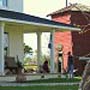 Front porch, with old water tower beyond